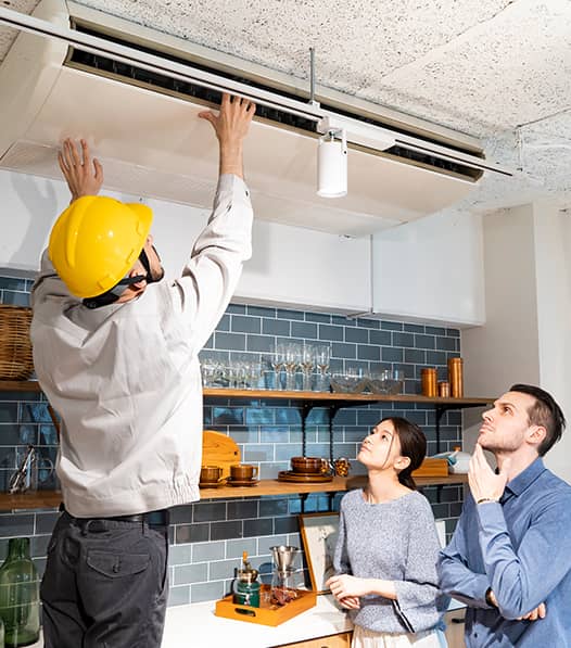 repairman-doing-air-con-service
